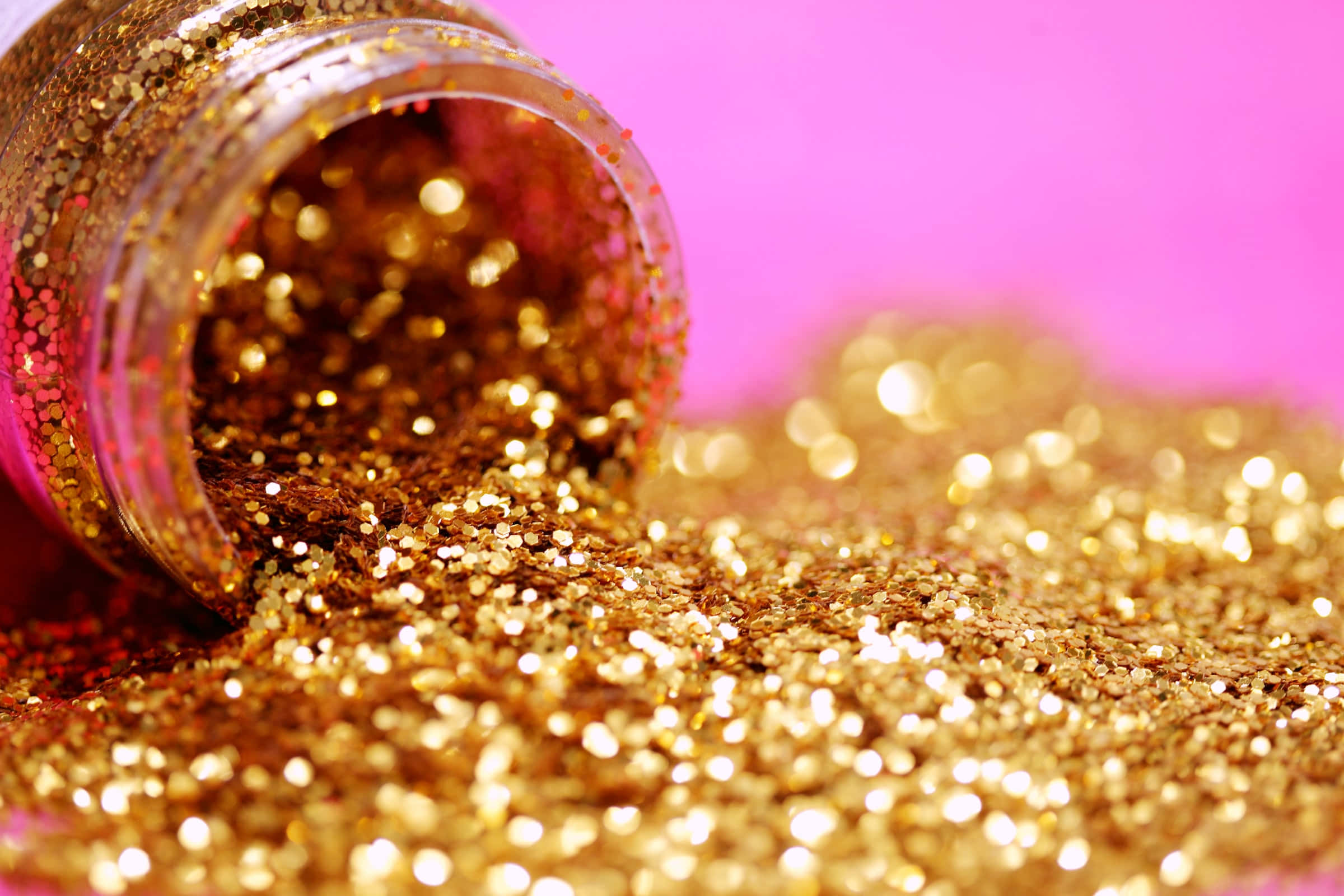 پس‌زمینه درخشش طلایی و glitter ریخته‌شده والپیپر