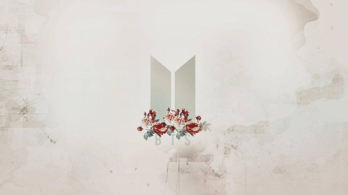 لوگوی BTS با گل‌ها لپ‌تاپ والپیپر
