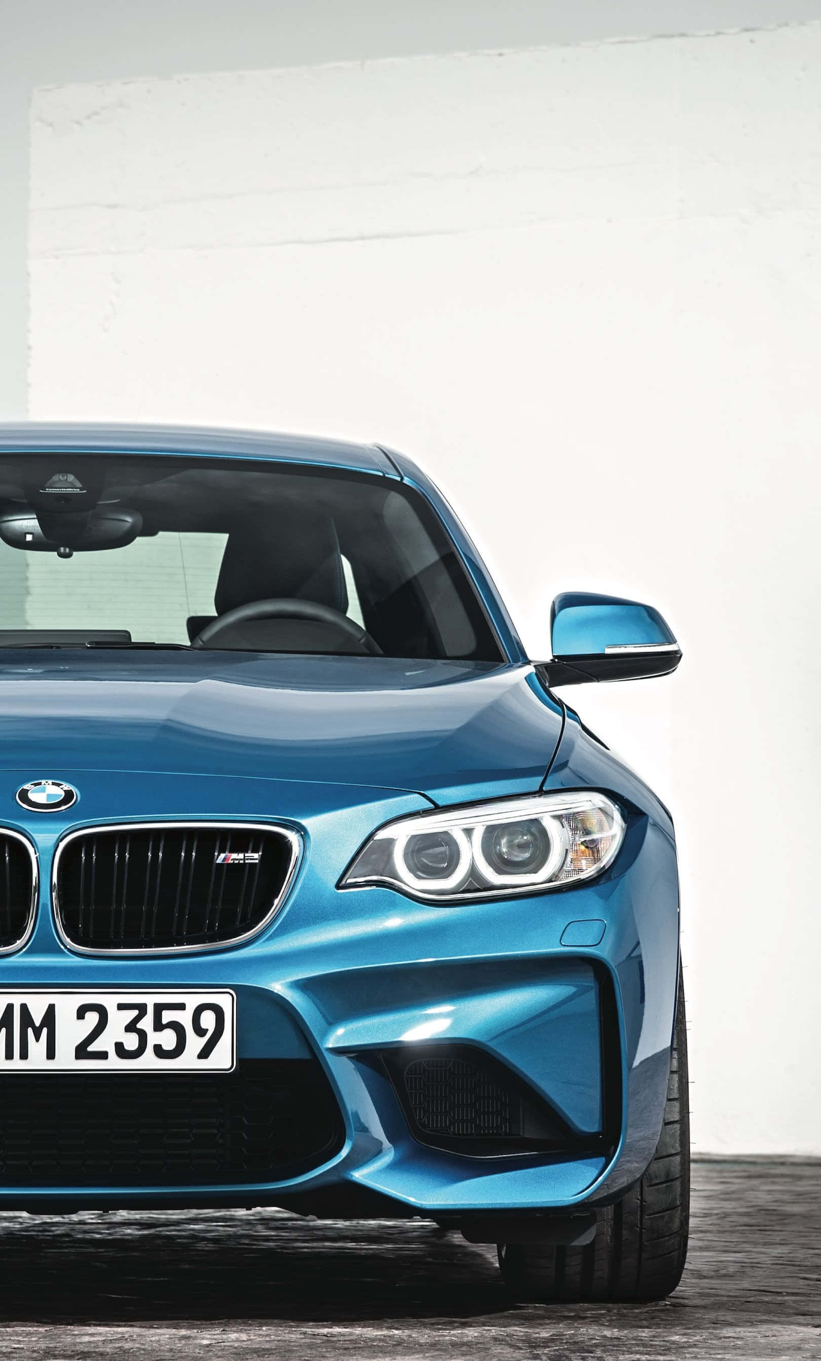 والپیپر شیک BMW برای آیفون با خودروی اسپرت و لوگوی زیبا والپیپر